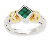Lustrous 14k white gold with yellow gold accents make this ring with invisible set square Emeralds and channel set round Diamonds