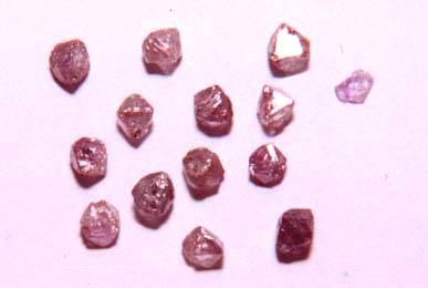 rough fancy pink-purple diamonds